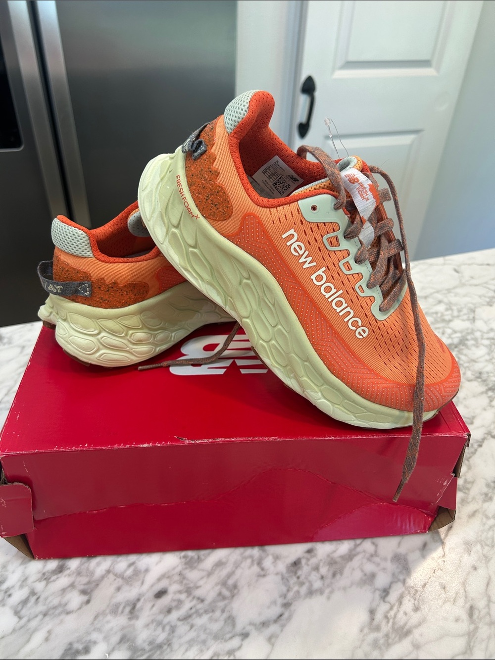 New Balance Women’s Orange and Cream Wide Trail Running Sneakers - Picture 3 of 4